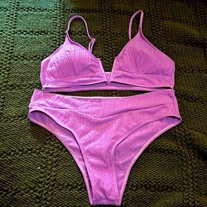 purple size Large 2 peice bathing suit with crossover bottoms  never worn.